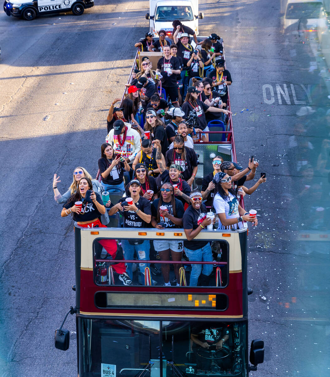 The Aces have fun with the fans during their championship parade along Las Vegas Boulevard to T ...