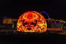 A flaming face graphic appears on the Sphere during the opening night of U2's residency Friday, ...