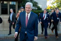 House Majority Whip Rep. Tom Emmer, R-Minn., followed by reporters, leaves the Republican caucu ...