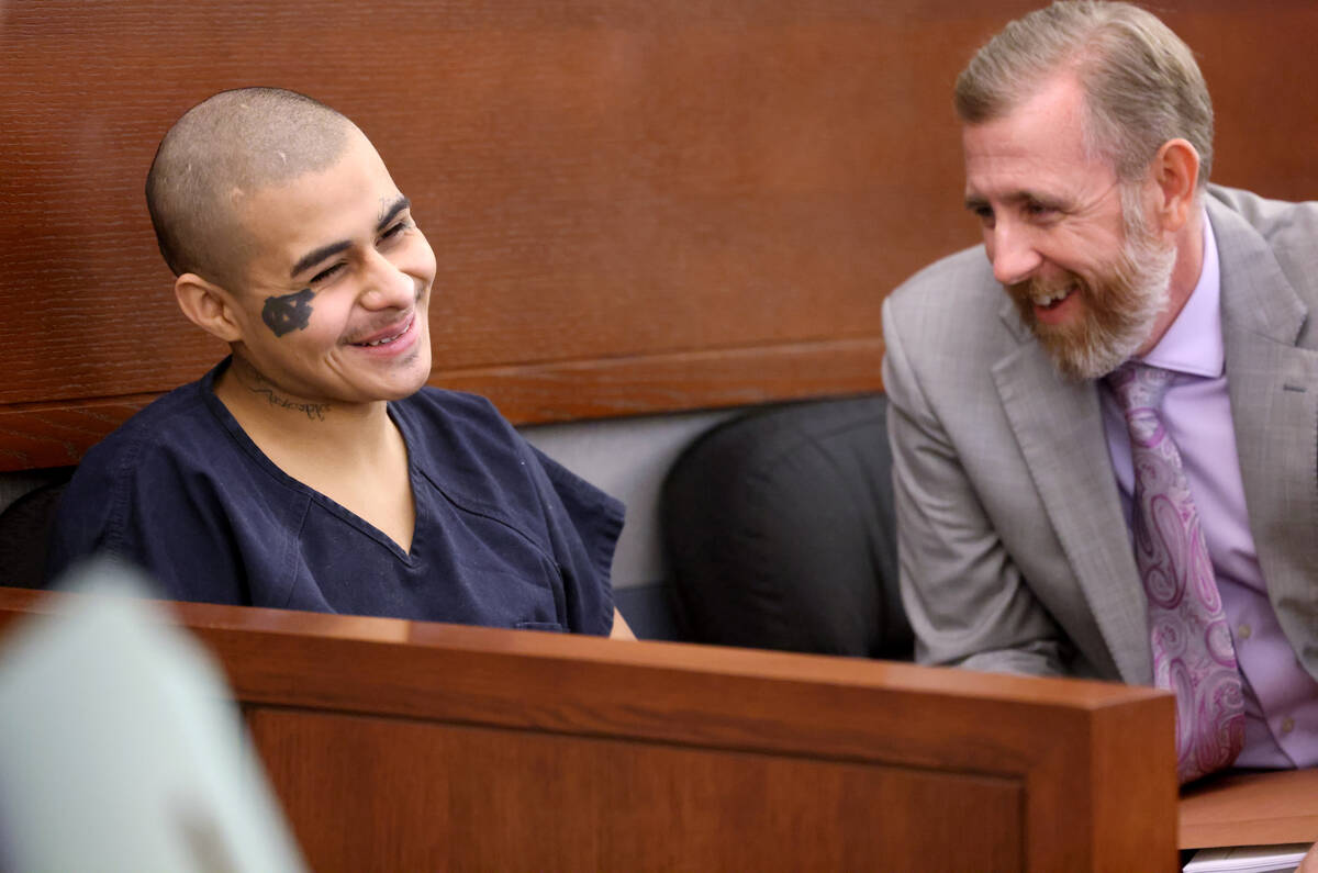 Jesus Ayala, 18, laughs with his attorney David Westbrook in court at the Regional Justice Cent ...