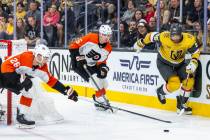 Golden Knights right wing Keegan Kolesar (55) chases down a puck against Philadelphia Flyers de ...