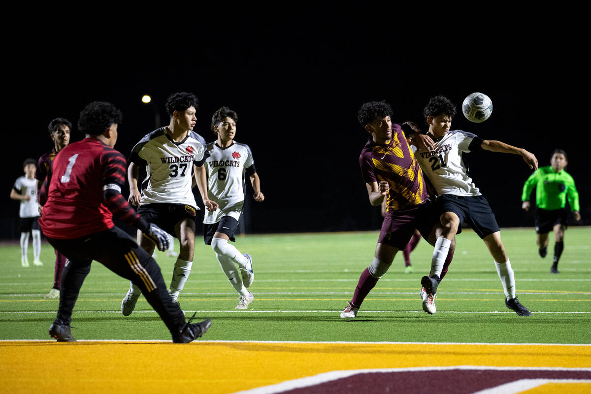 Eldorado defender Jesse Garcia (20) and Las Vegas' Valentin Mendoza (21) battle near the goal d ...