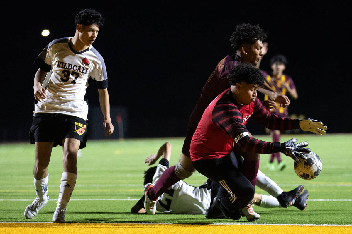 Las Vegas' goalkeeper Byron Medina (1) saves a shot by Eldorado defender Jesse Garcia (20) whil ...