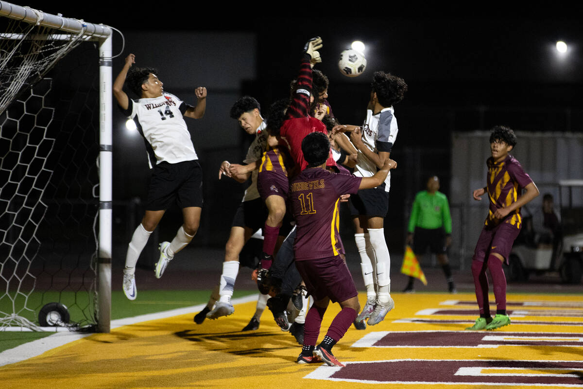 Las Vegas jumps to head away an Eldorado penalty kick during the second half of a boys high sch ...