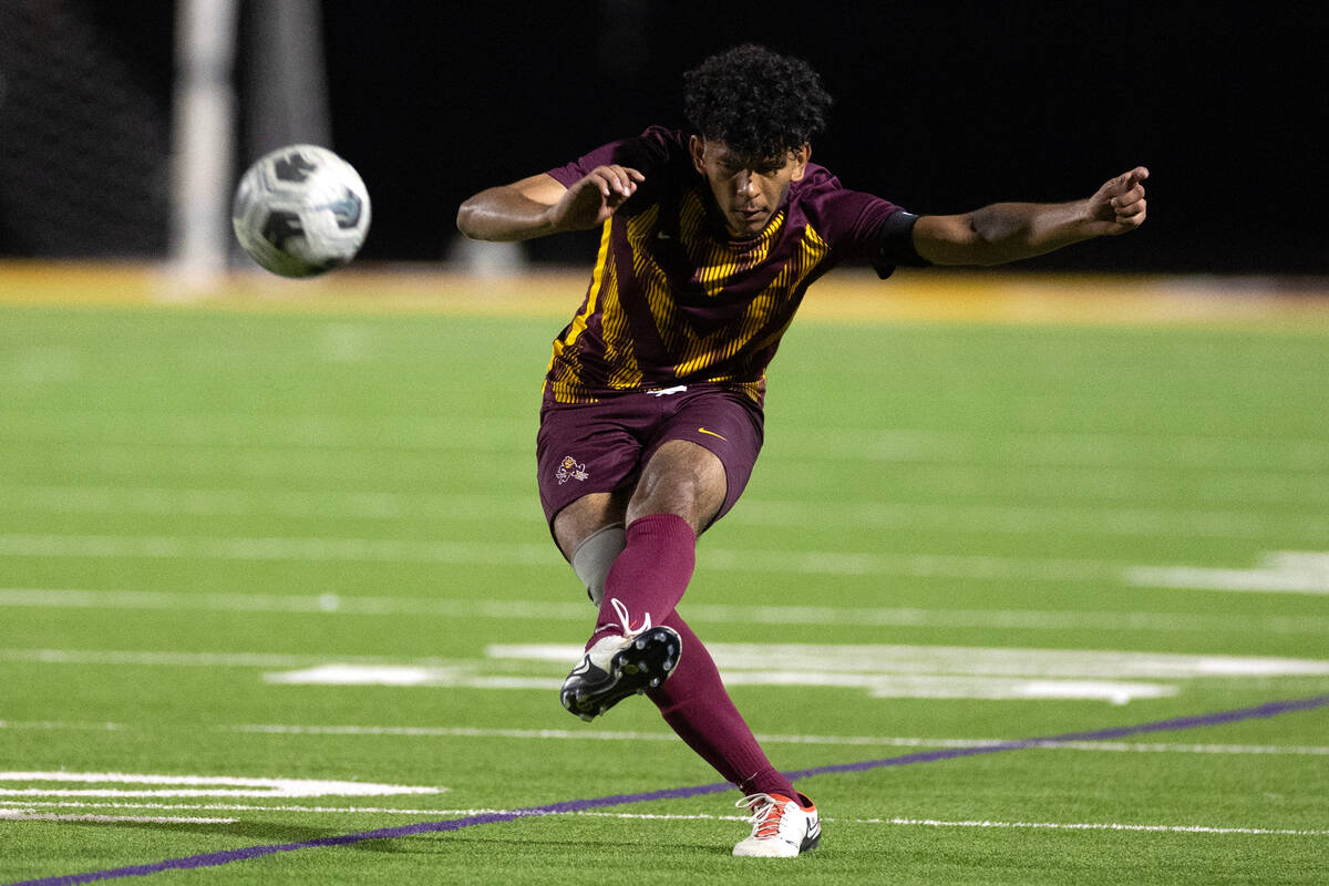 Eldorado defender Jesse Garcia (20) kicks the ball up the field during the second half of a boy ...