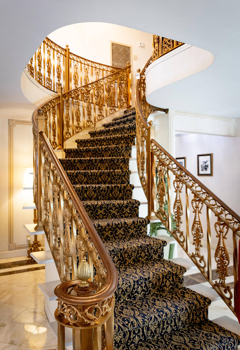 Liberace bought the curved staircase from a can-can bar in Paris. It now occupies the entryway ...