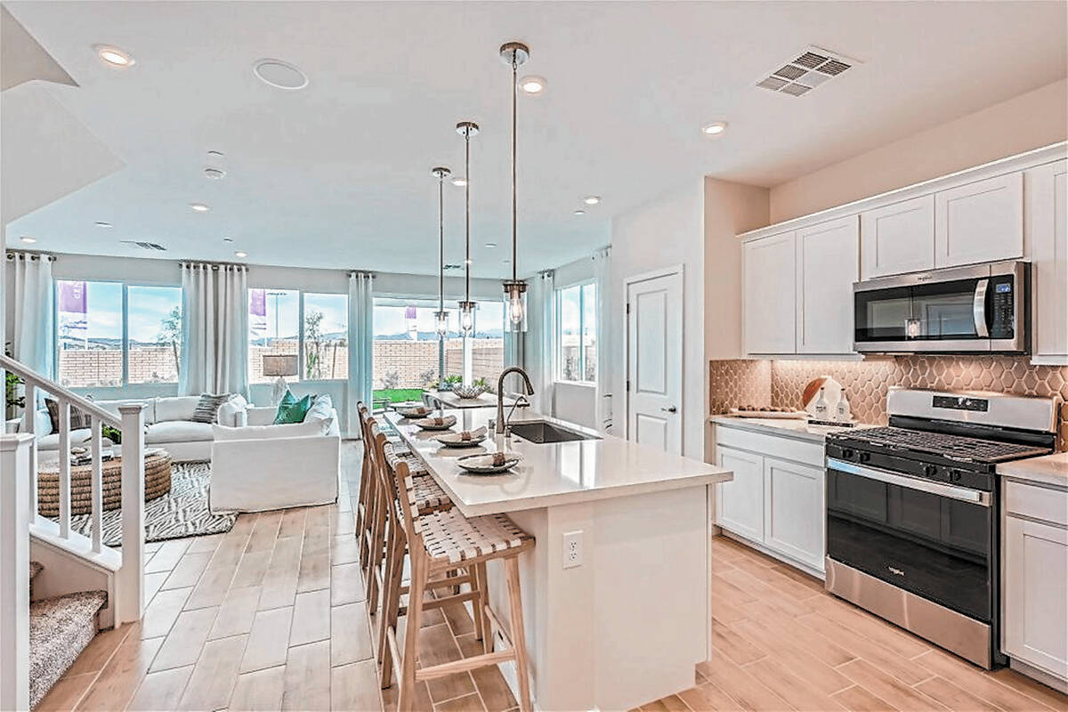 Century Communities One of Modena I floor plans features a kitchen with a large isla ...