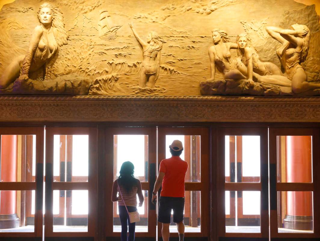 Guests leave Treasure Island, on Wednesday, Oct. 25, 2023, in Las Vegas. (Bizuayehu Tesfaye/Las ...