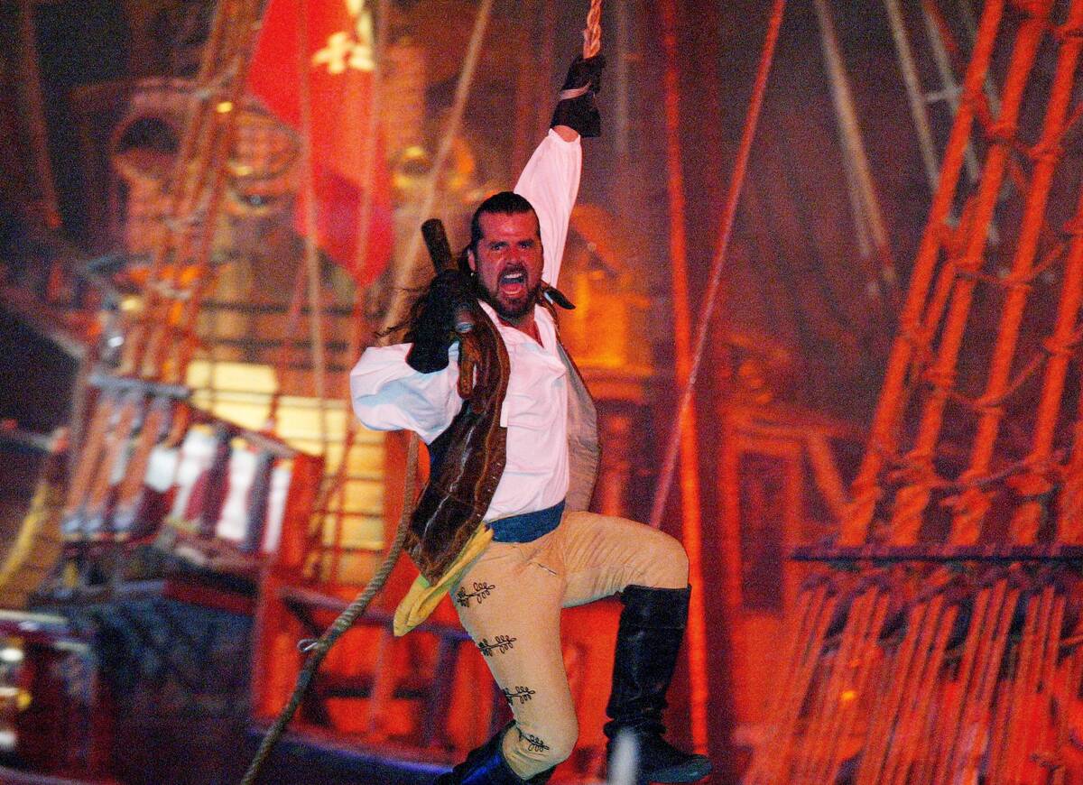 The Pirate ship captain Greg Zuniga makes his last swing into action before thousands of fans d ...