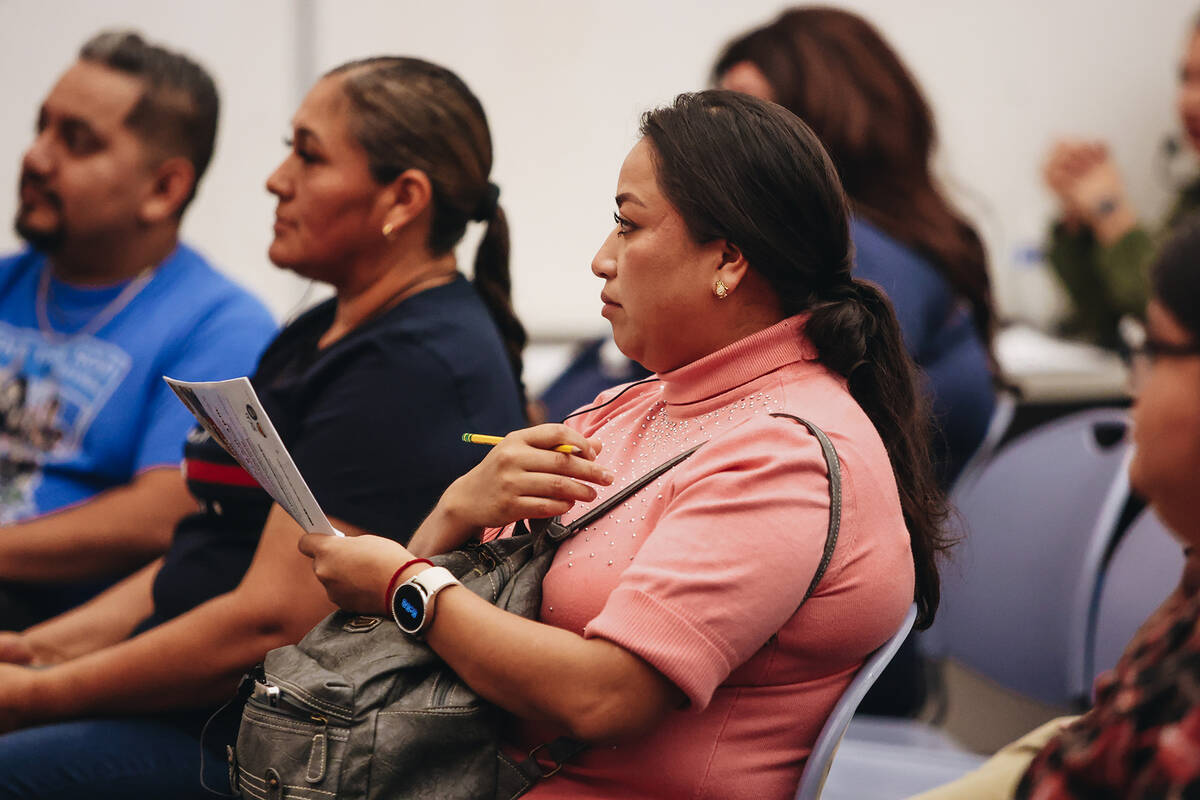 Marely Rosales, a sidewalk vendor, listens to a Make the Road Nevada meeting about food vendors ...