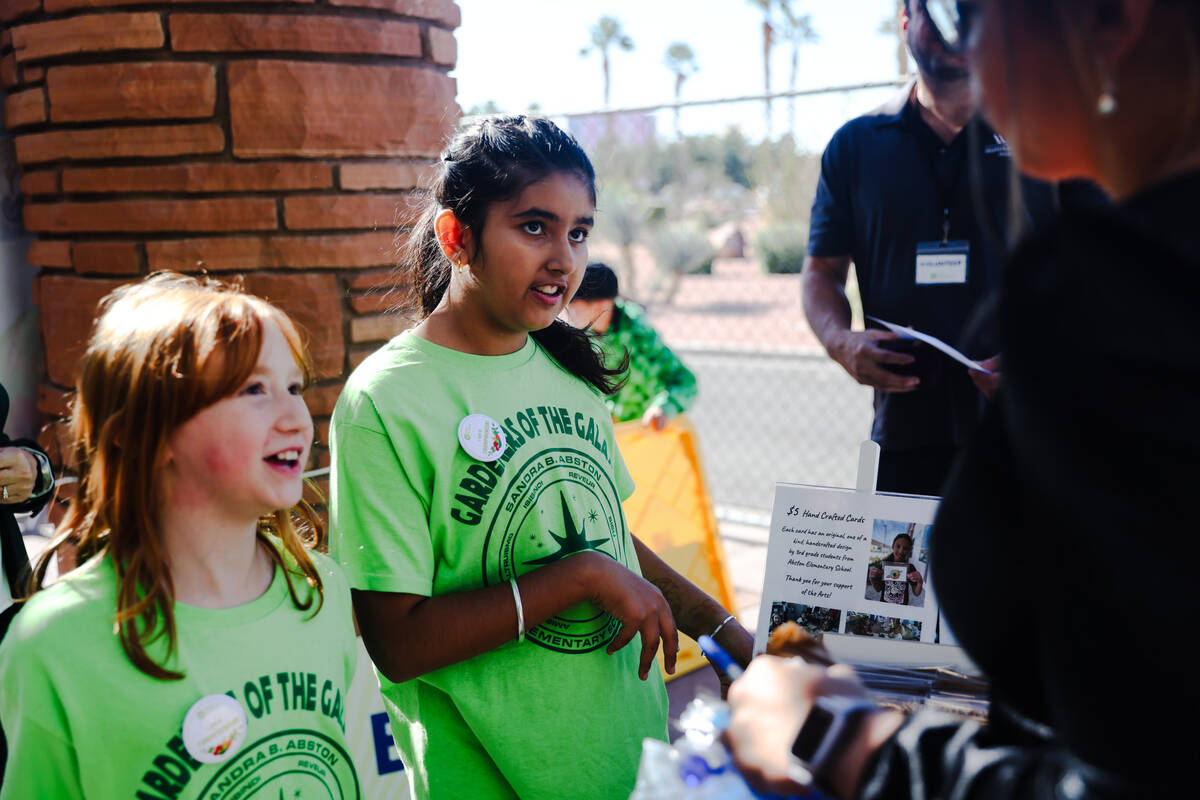 Charlotte Rowe, 9, left, and Japleen Kaur, 9, sell Abston Elementary’s goods to customers at ...