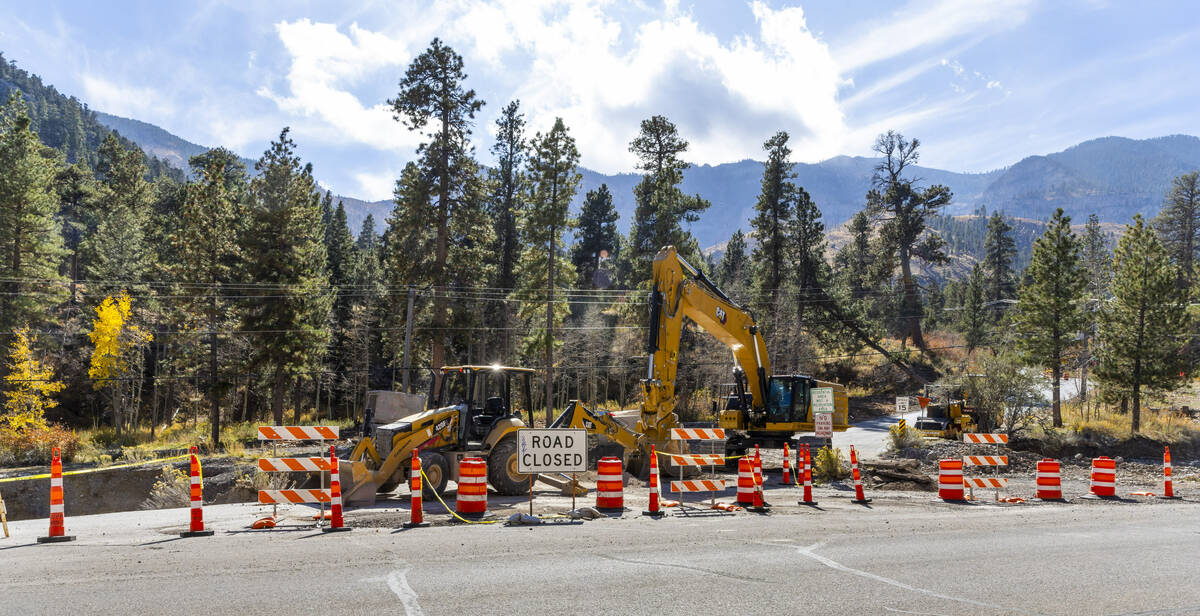 A main road into the Rainbow Canyon subdivision is still damaged and closed as repairs continue ...