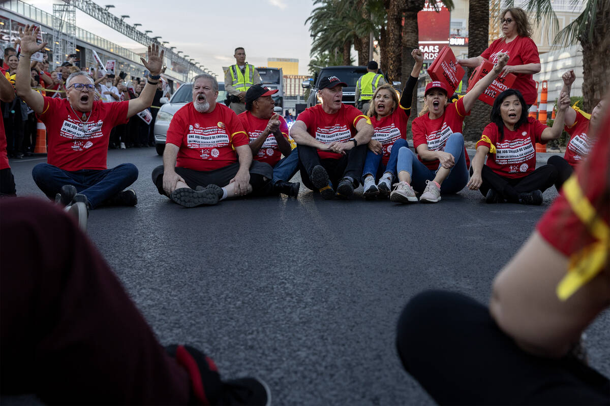 Culinary union members block Las Vegas Boulevard during a rally with thousands of fellow hotel ...