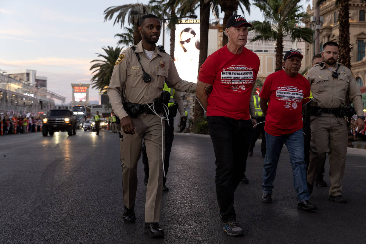 Culinary union members are arrested for blocking traffic during a rally along Las Vegas Bouleva ...