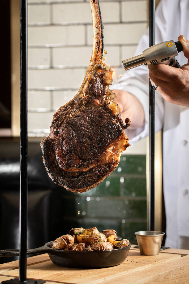 A swinging tomahawk steak is being offered at Smith & Wollensky in the Grand Canal Shoppes at T ...