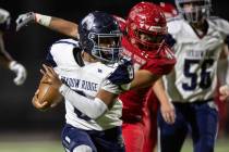 Shadow Ridge quarterback Coen Coloma (8) runs for a touchdown over Arbor View during the second ...