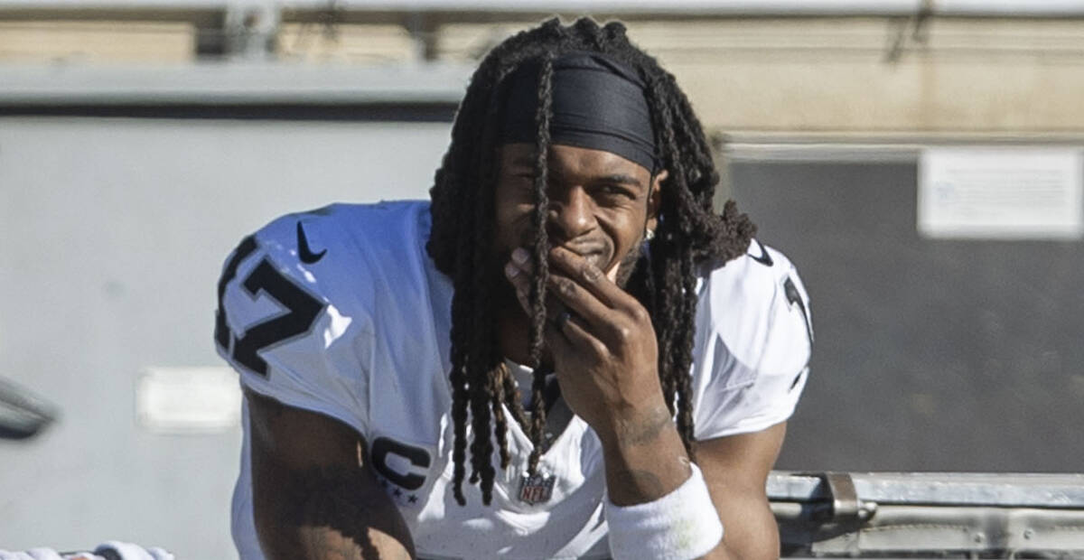 Raiders wide receiver Davante Adams (17) looks on from the sideline during the second half an N ...