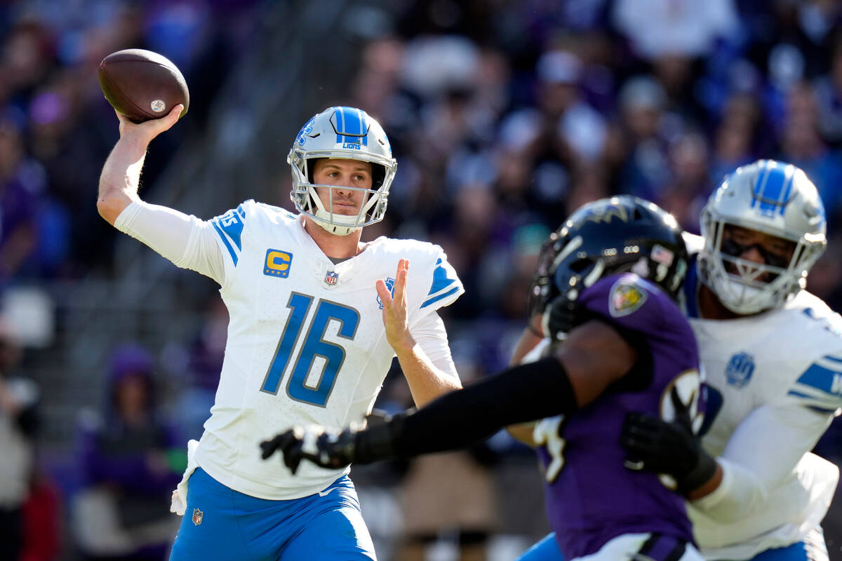 Detroit Lions quarterback Jared Goff throws during the second half of an NFL football game agai ...