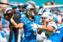 Carolina Panthers quarterback Bryce Young (9) throws the ball under pressure from Miami Dolphin ...