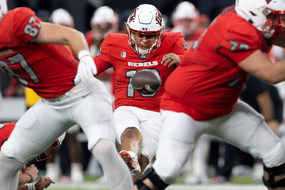 UNLV place kicker Jose Pizano (18) kicks for a field goal during the first half of an NCAA col ...