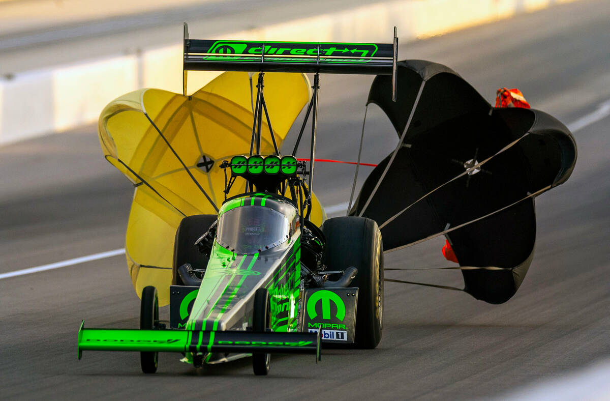 Top Fuel racer Leah Pruett deploys her parachute during a qualifying session in the NHRA Nevada ...