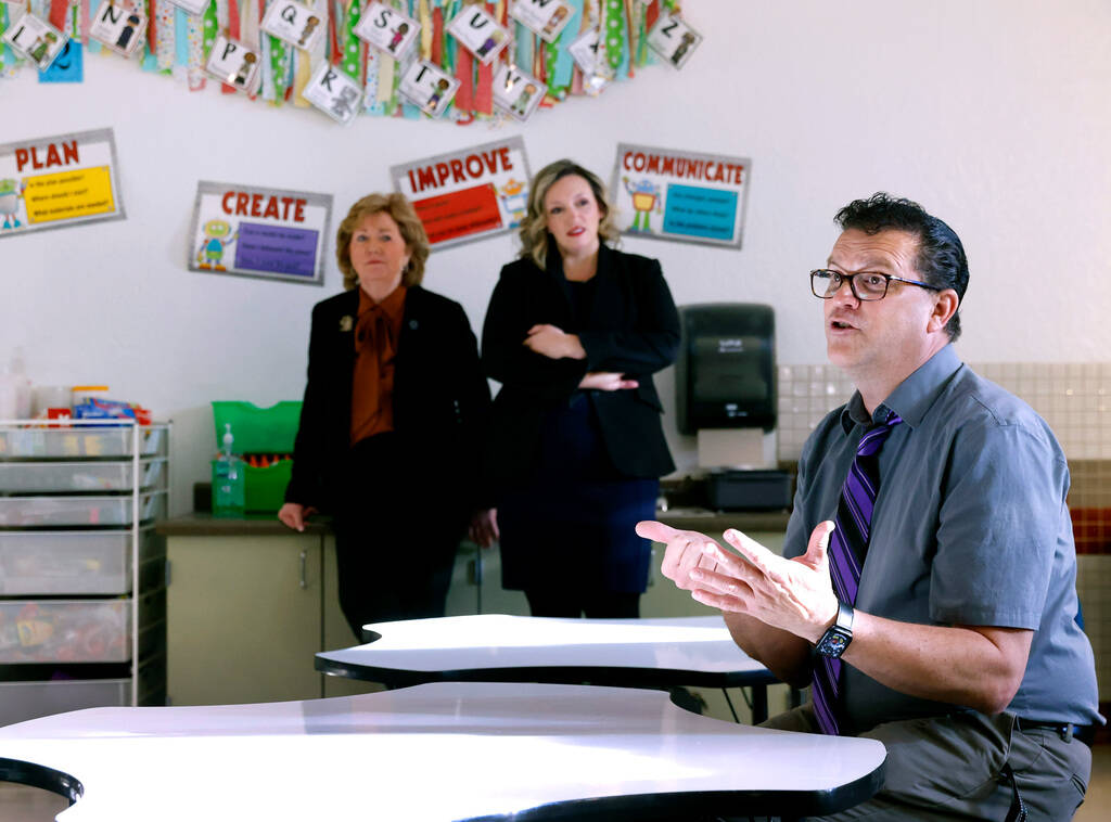 David Hudzick, principal of Clarence A. Piggott Academy, speaks as state Sen. Marilyn Dondero L ...