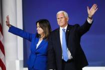 Former Vice President Mike Pence announces the end of his presidential campaign, alongside his ...