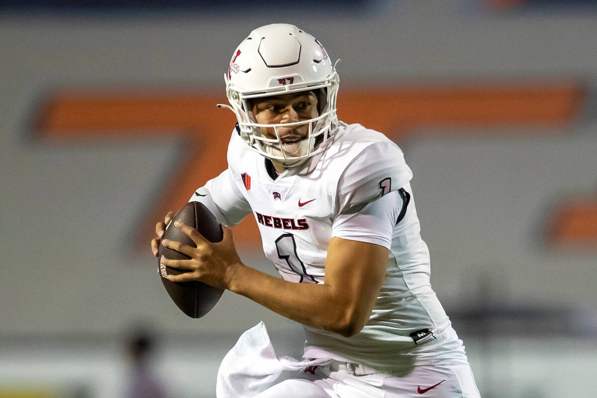 UNLV quarterback Jayden Maiava rolls out looking for an open receiver during the second half of ...