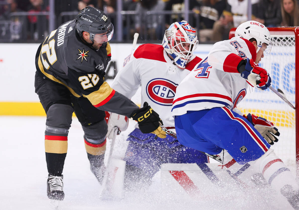 Golden Knights right wing Michael Amadio (22) takes a shot against Montreal Canadiens goaltende ...