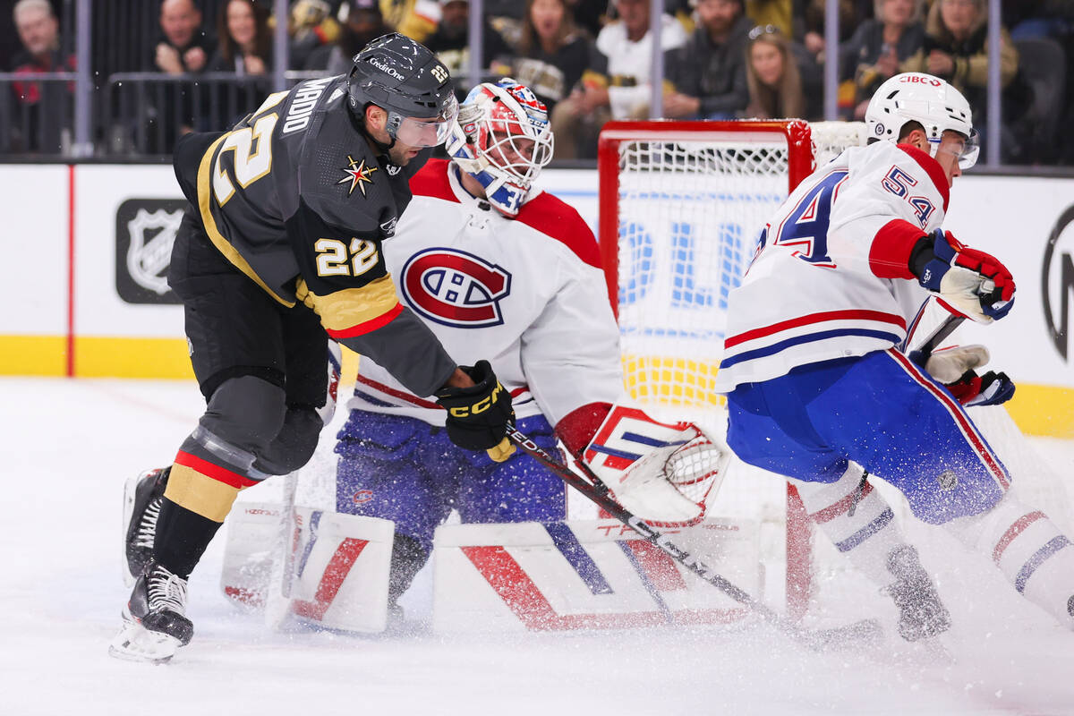 Golden Knights right wing Michael Amadio (22) takes a shot against Montreal Canadiens goaltende ...