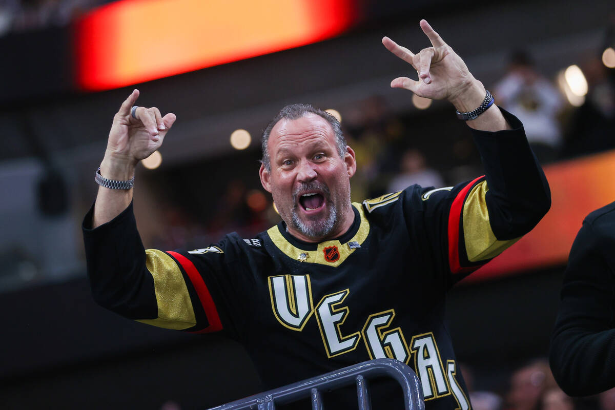 Golden Knights fans celebrate a goal made by the Golden Knights during their NHL game against t ...
