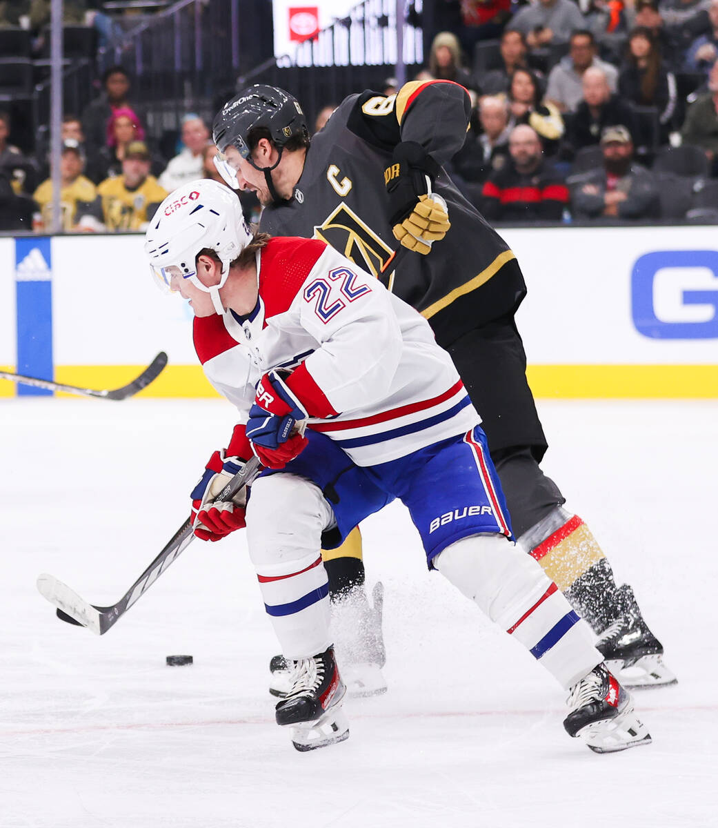 Montreal Canadiens right wing Cole Caufield (22) and Golden Knights right wing Mark Stone (61) ...