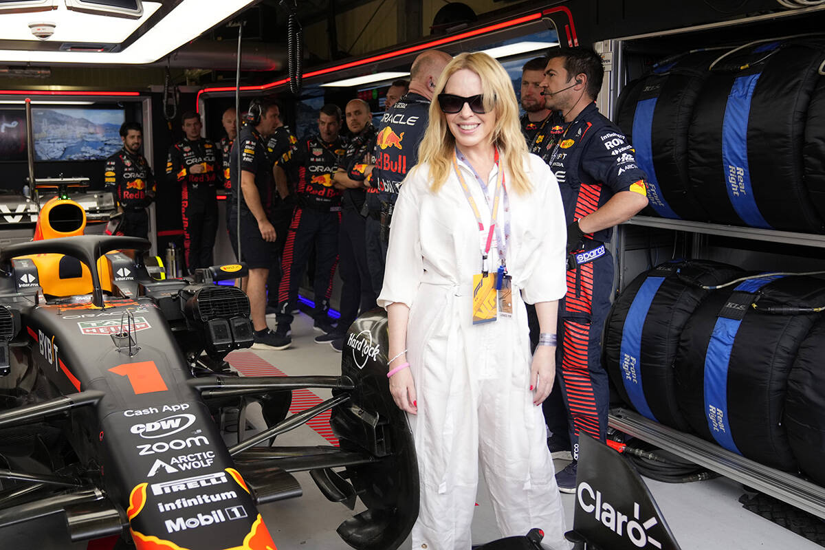 Australian singer Kylie Minogue stands in the Red Bull garage prior to the Monaco Formula One G ...