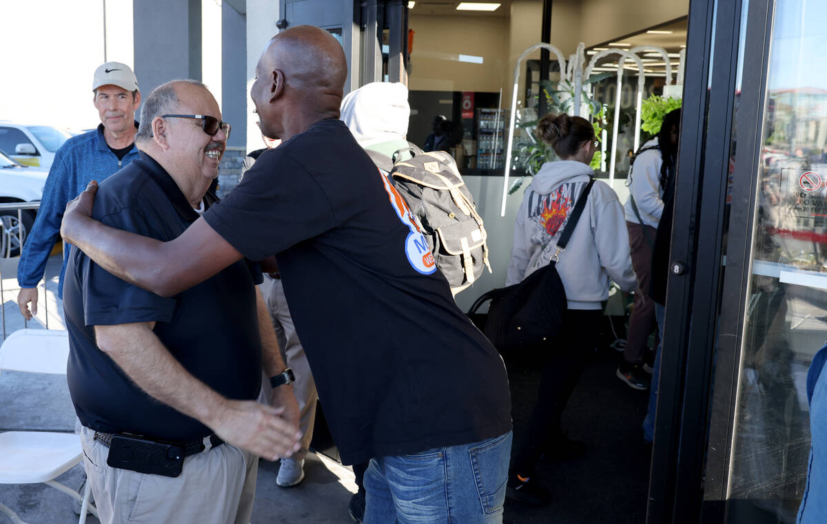 Owner and namesake Mario Berlanga, left, gets a hug from his cook Margretta Dixon during the gr ...