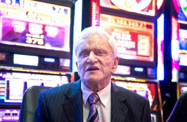 Don Laughlin, owner of the Riverside Resort, sits near a bank of slot machines during the 50th ...