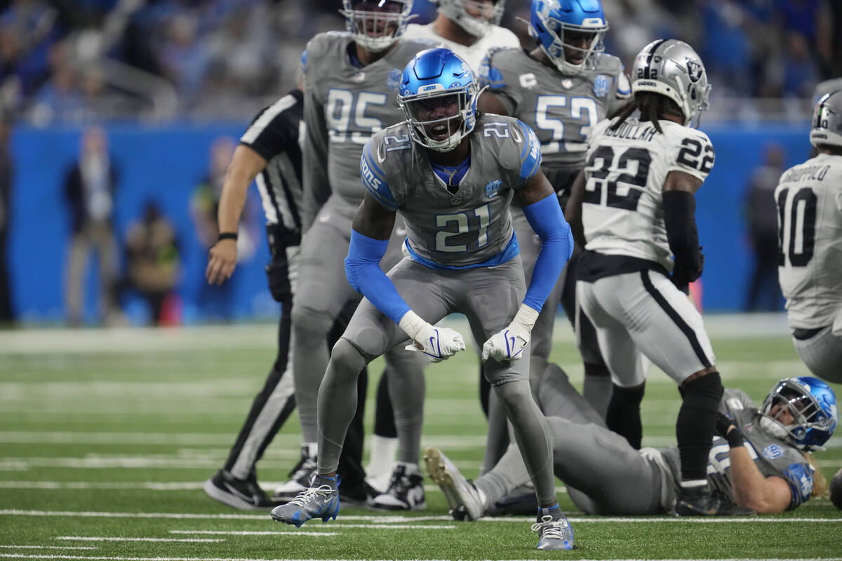 Detroit Lions safety Tracy Walker III (21) reacts after sacking Las Vegas Raiders quarterback J ...