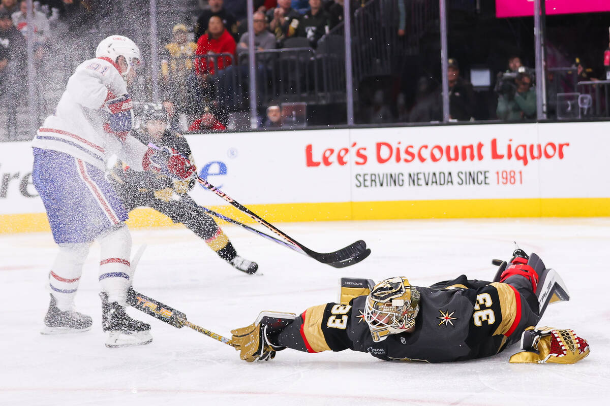 Montreal Canadiens center Sean Monahan (91) takes a shot while Golden Knights goaltender Adin H ...