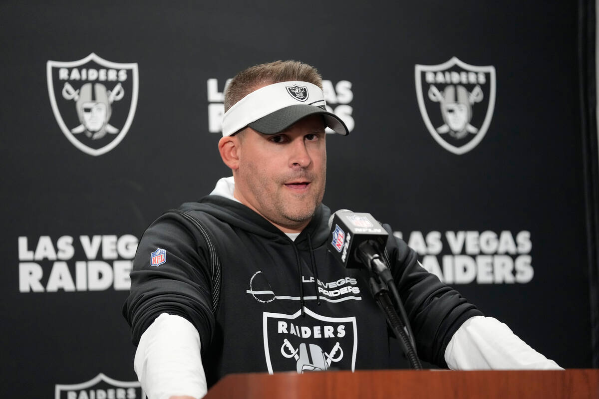 Las Vegas Raiders head coach Josh McDaniels addresses the media after the NFL football game aga ...