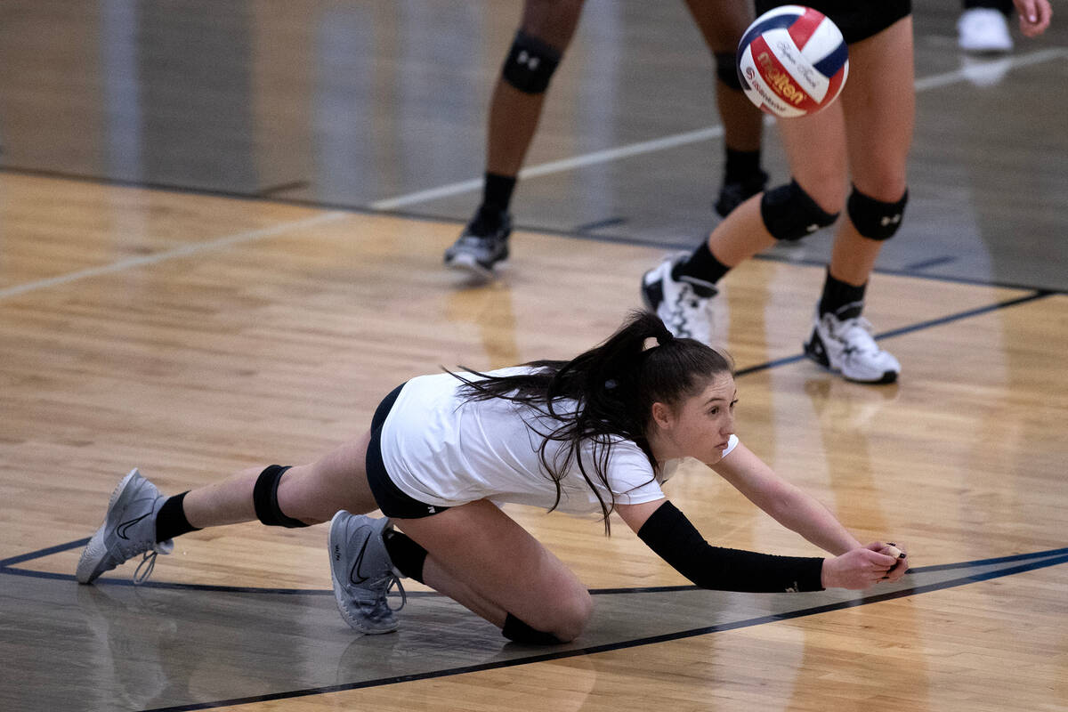 Faith Lutheran's Olivia Faulis (11) dives for the ball during a Class 5A Southern Region quarte ...