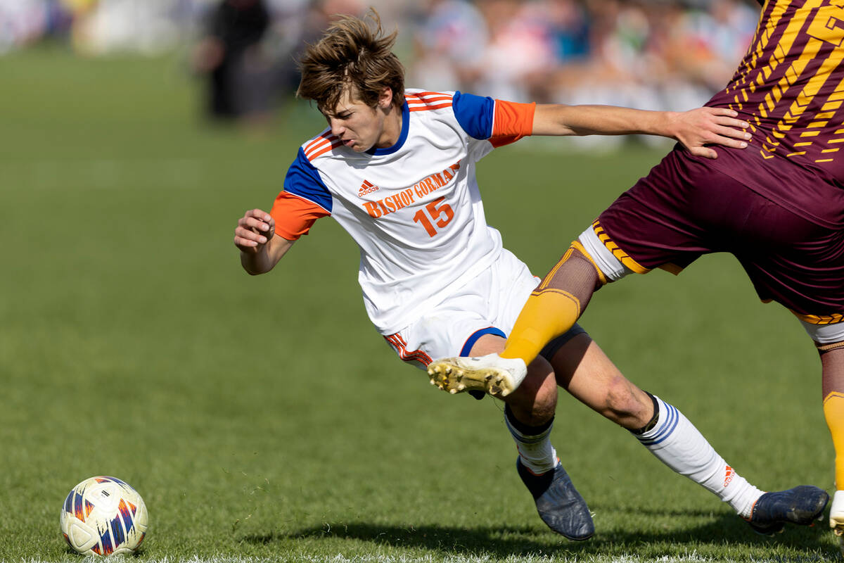 Bishop Gorman’s Chase Stewart (15) attempts to recover the ball from Eldorado’s J ...