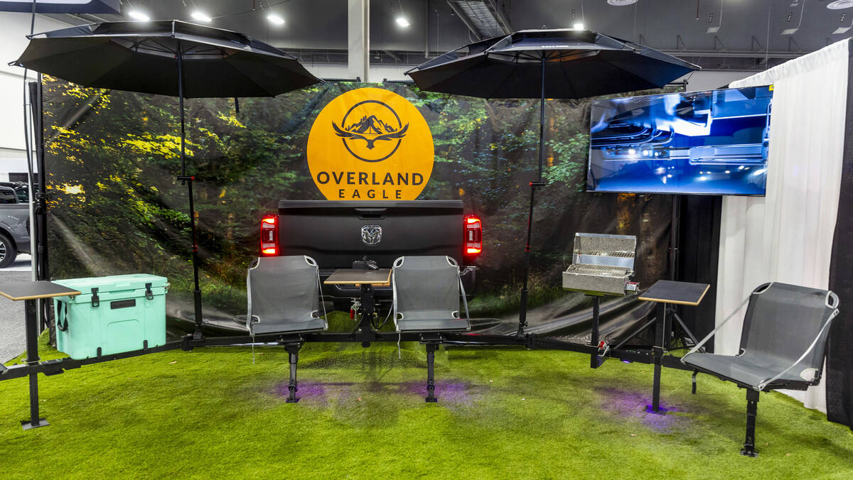 Overland Eagle displays its tailgate seating attachment which unfolds after being folded off of ...