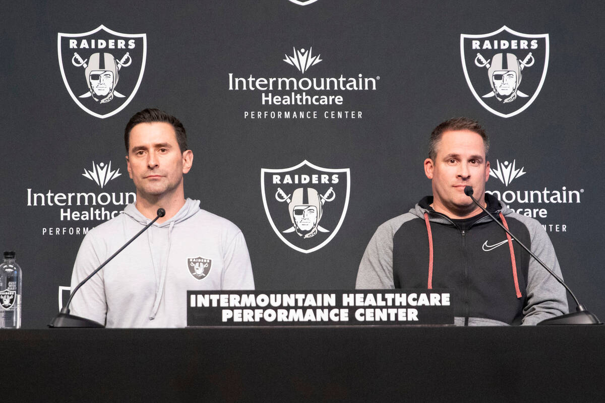 Raiders general manager Dave Ziegler, left, and head coach Josh McDaniels take questions during ...