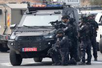 Israeli police deploy near Ashkelon, Israel, on Sunday, Oct.8, 2023. (AP Photo/Ohad Zwigenberg)