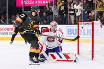 Golden Knights defenseman Shea Theodore (27) makes the winning goal against Montreal Canadiens ...