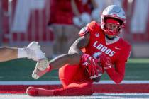 New Mexico's Jeremiah Hixon makes a touchdown reception during the first quarter an NCAA colleg ...