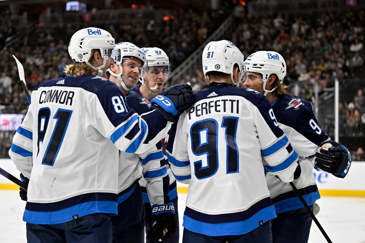 The Winnipeg Jets celebrate a goal by left wing Alex Iafallo (9) against the Vegas Golden Knigh ...
