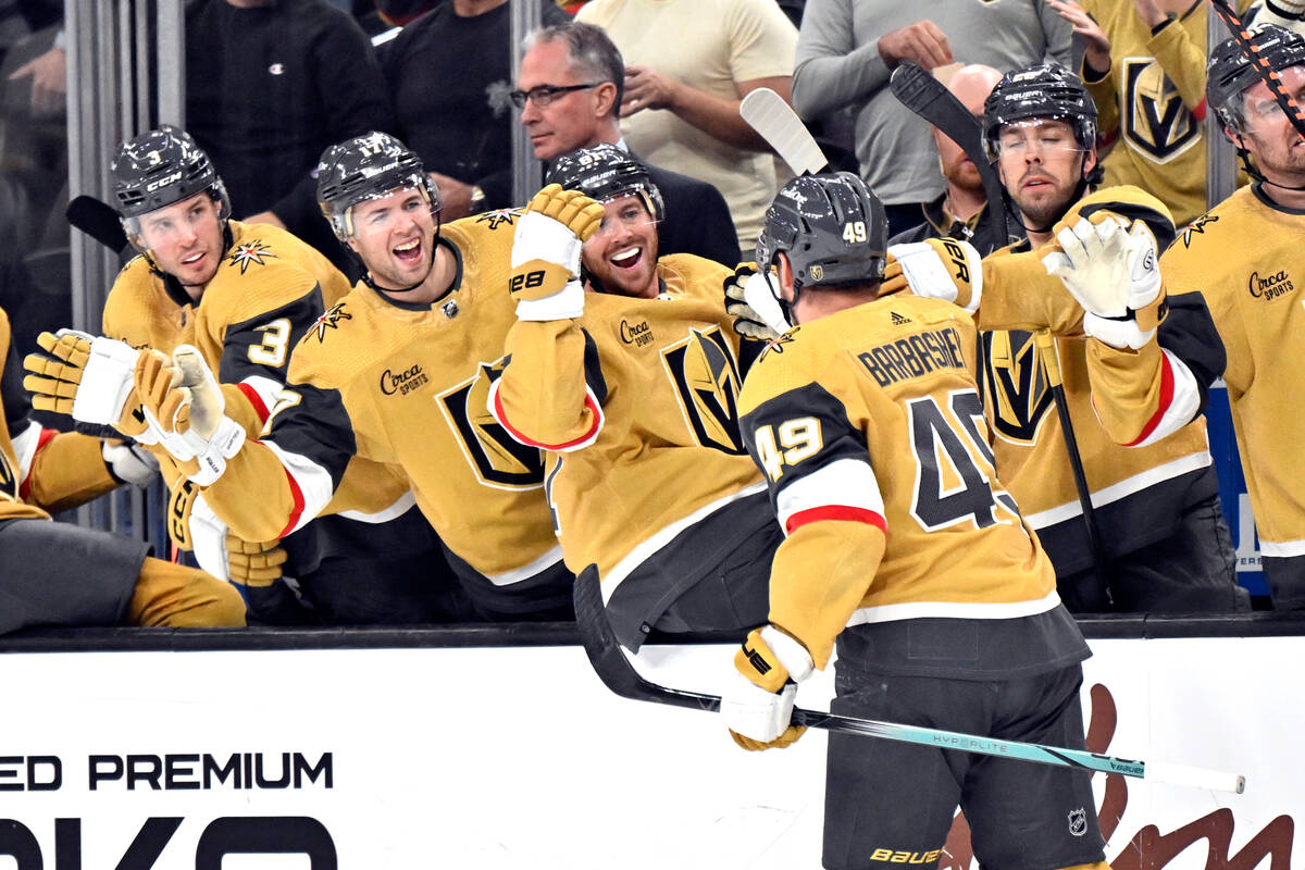 Vegas Golden Knights center Ivan Barbashev (49) celebrates with the bench after scoring against ...