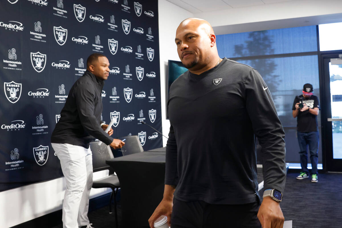 Champ Kelly, Raiders interim general manager, left, and Antonio Pierce, interim head coach, lea ...