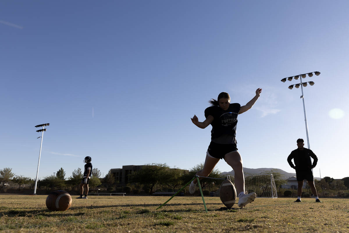 Kicker Gracie Rhodes practices her boot during football practice at Lake Mead Christian Academy ...