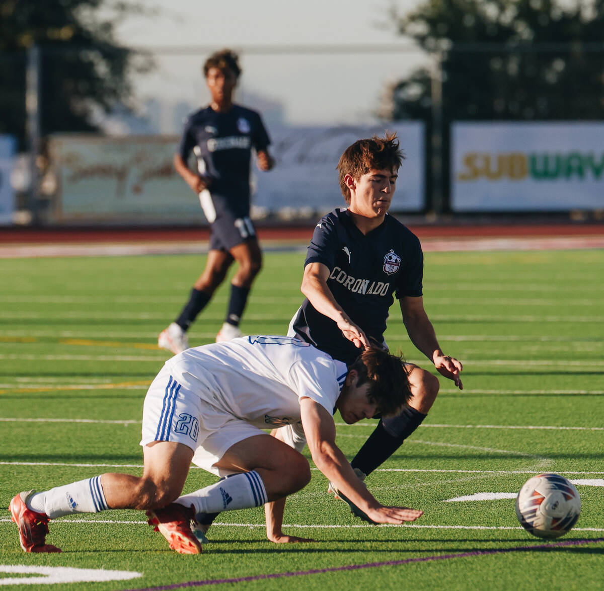 Coronado’s Grayson Elisaldez (3) and Bishop Gorman’s Alexander Rogers (20) chase ...